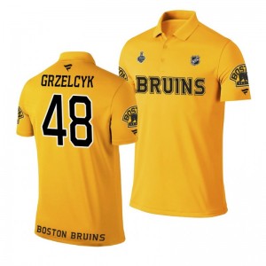 Bruins 2019 Stanley Cup Final Name & Number Gold Matt Grzelcyk Polo Shirt - Sale