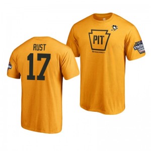 Penguins Bryan Rust 2019 NHL Stadium Series Name and Number Gold T-Shirt - Sale