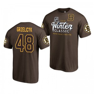 Matt Grzelcyk Bruins 2019 Winter Classic Ice Player T-Shirt Brown - Sale